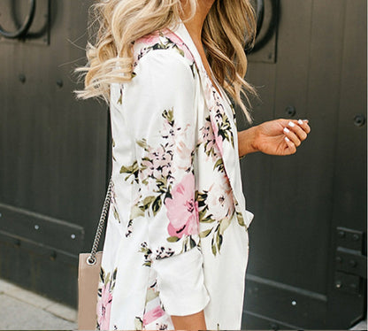 Rebecca – Lange Damesjas met Bloemenpatroon en Zakken