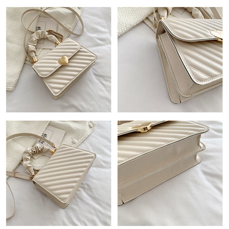 Leah – Modieuze Schoudertas met Ketten en Liefde Metaal Design