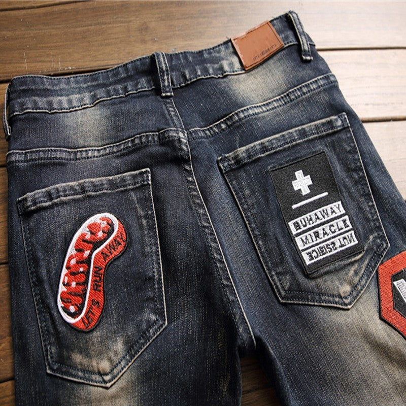 Susan – Ripped Jeans met Badge-Patch