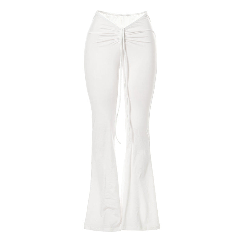 Lauren – Wijde geplooide broek met laaghangende taille in effen wit