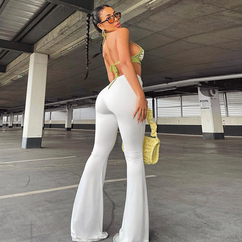 Lauren – Wijde geplooide broek met laaghangende taille in effen wit